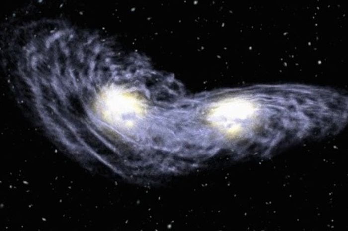 Apa yang sebenarnya terjadi ketika dua galaksi bertabrakan?  Untuk waktu yang lama, para astronom percaya bahwa jika bintang piringan bergabung ke dalam tabrakan bintang piringan lain, mereka akan membentuk galaksi elips.  Apakah itu benar