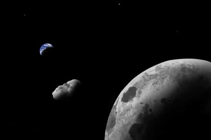 Gambar oleh seniman Camo Oleva dari Bumi-Satelit di dekat sistem Bumi-Bulan.  Dengan menggunakan teleskop teropong besar, para astronom telah menunjukkan bahwa ini mungkin bagian dari bulan yang hilang.